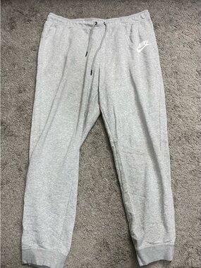 Nike Light Gray Men's Fleece Joggers with White Swoosh